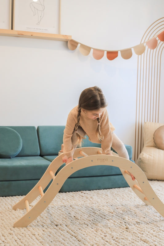 Montessori toys and developmental toys. Climbing frame for toddlers. Our Pikler climbing arch supports early childhood motor skills development. 